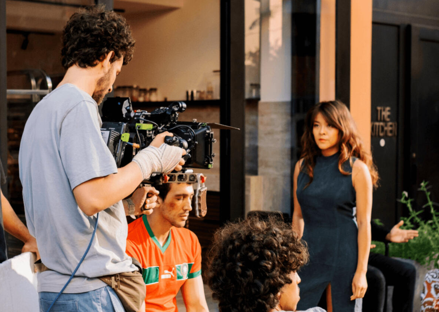Lucy on a film set with a camera crew
