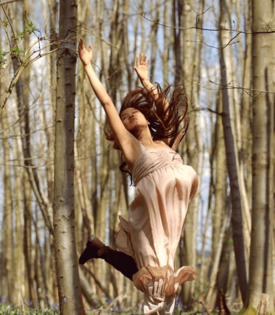 Lucy moving through a forest