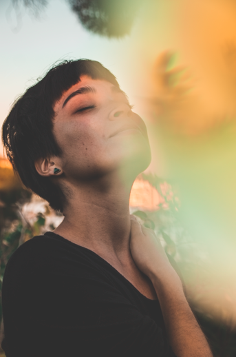 Sunlit portrait with soft colour overlays