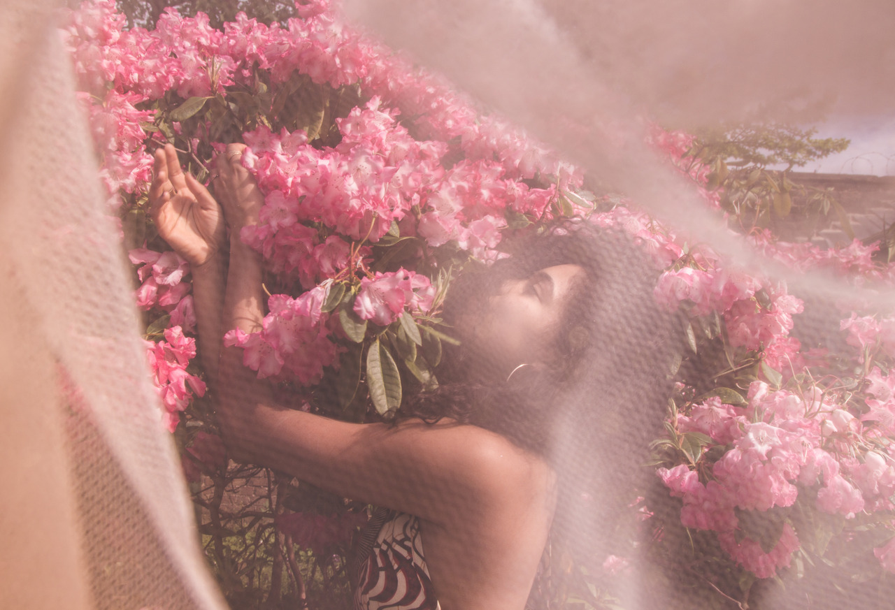 Portrait among pink flowers